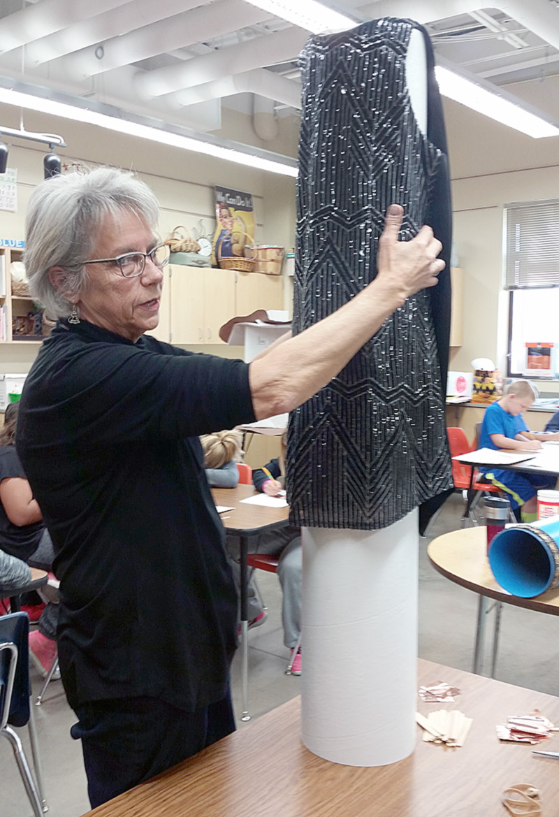Halsey worked with the class on how to best use the flapper dress on the pillar.