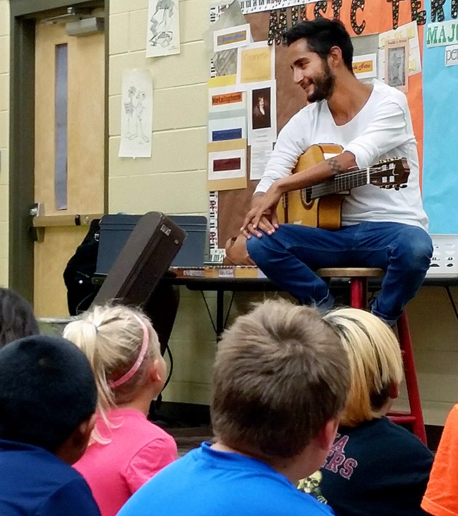 Band leader, Santiago Orozco, answers music students questions.