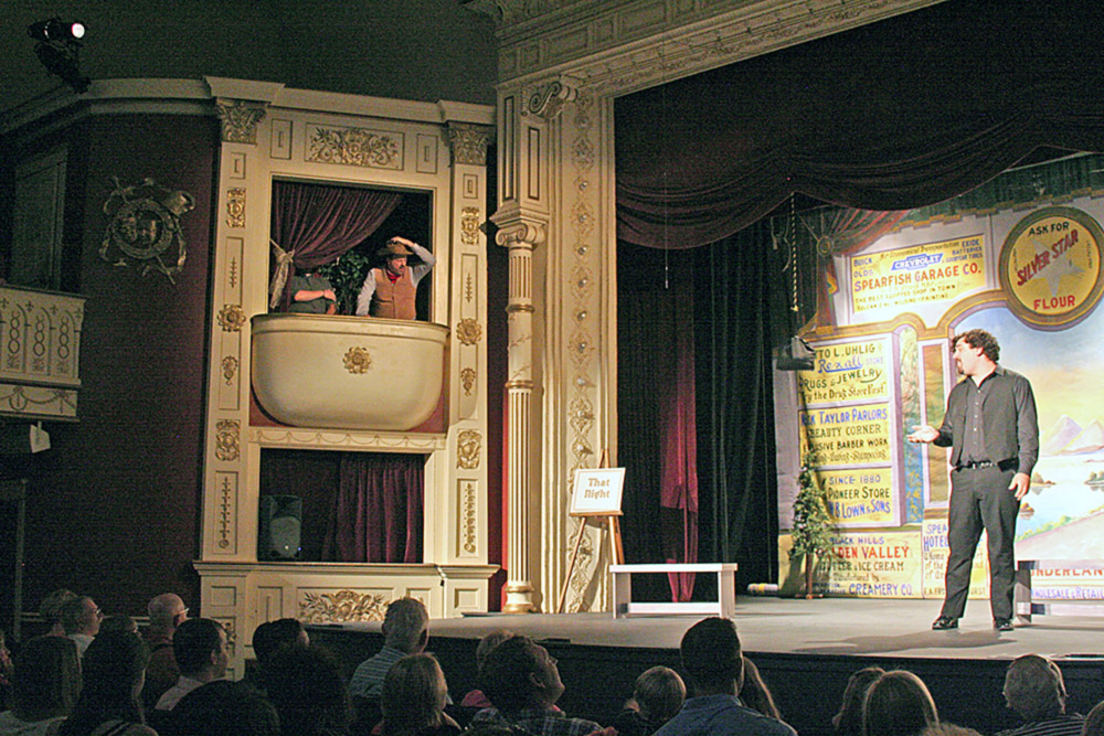Cobblebaum gets cowboy grief from both sides of the stage.