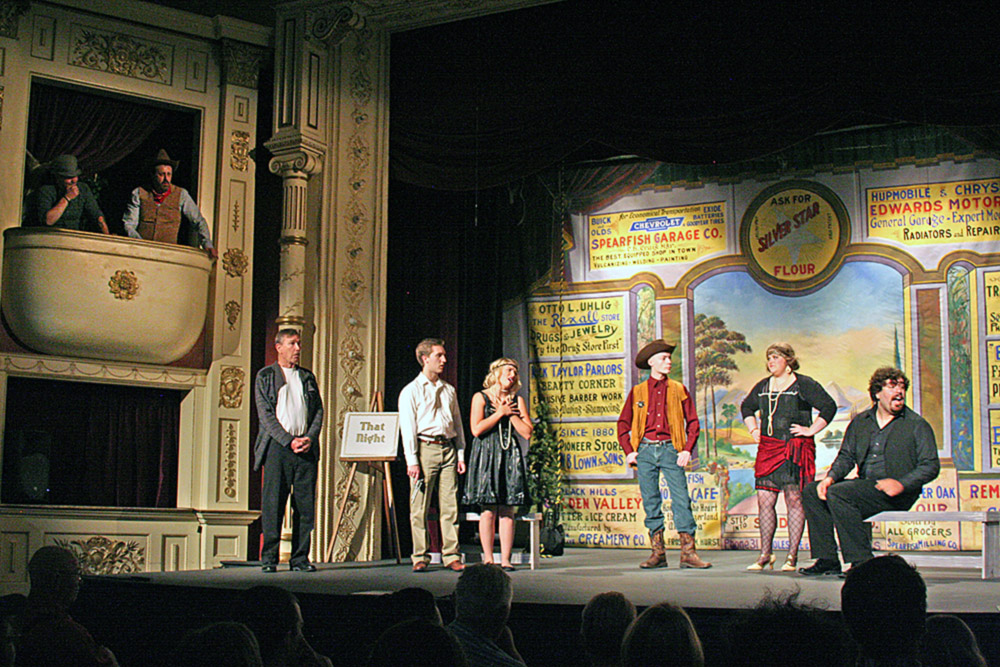 People are calling for a hanging. The audience really gets into it.
