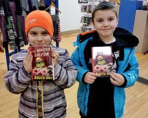 Two of the boys who received their free books.